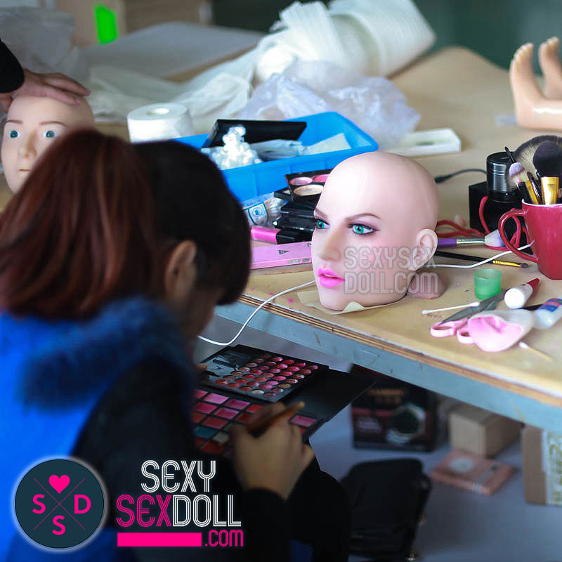 sex doll factory-Professional Makeup Artist Working on The Doll